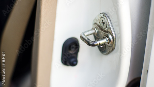 Car door striker plate hook, car lock system.