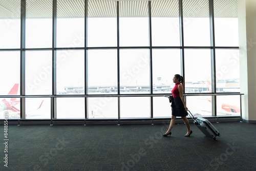 Business woman waiting for delayed flight.woman at the airport. flight delay © tonjung