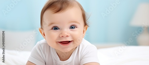 Happy cute baby with a beautiful smiling face in a joyful adorable expression ideal for children people infancy and age concepts in a delightful copy space image