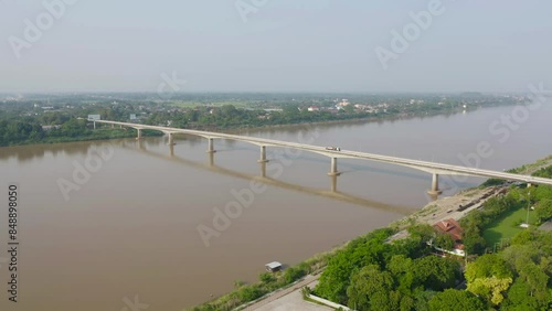 Wallpaper Mural Aerial view of Thai Laos bridge with Mekong River with green mountain hill. Nature landscape background in Ubon Ratchathani, Thailand. Torontodigital.ca