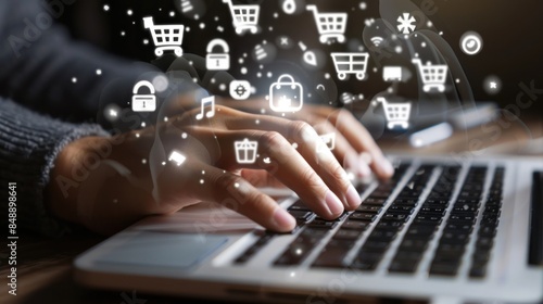 Close-up of hands young man using a laptop with online shopping cart icons, e-commerce concept. Digital marketing and web development technology for a virtual global market business.