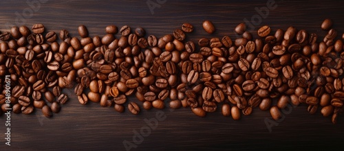 Roasted coffee beans backdrop with space for text. Copy space image. Place for adding text and design