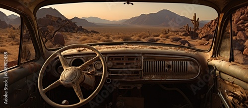 Desert junkyard with a vintage car s abandoned dashboard offers a unique setting for a copy space image