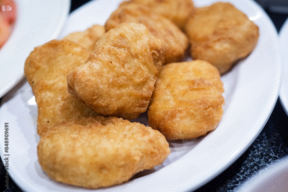 Chicken nuggets is frozen chicken snacks made from selected pure chicken meat. Ready-to-eat snacks, just fry. Contains protein from chicken meat. Chicken nuggets is frozen chicken snacks made from selected pure chicken meat. Ready-to-eat snacks, just fry. Contains protein from chicken meat.