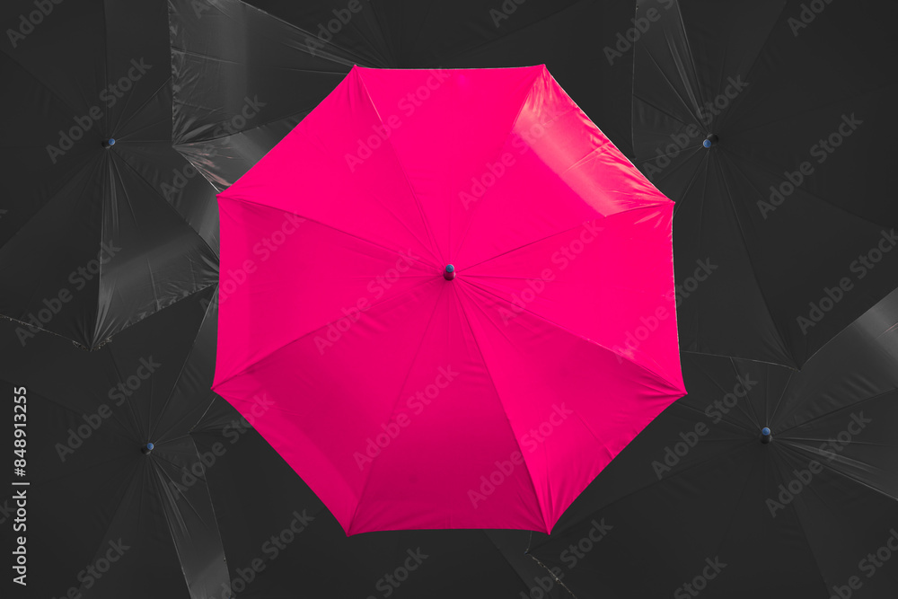 the colorful umbrella in the dark background the colorful umbrella in the dark background