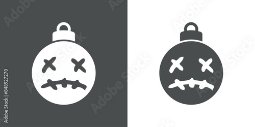 Tiempo de Navidad. Logo con silueta de bola de navidad con cara de zombi para Halloween