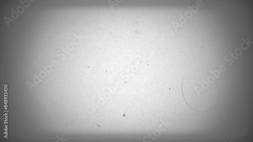 Vintage white film background with vignette. Copy space on centre. Old retro wipe rolling effect. Scratches, details and noise. Dusty and grainy feel. 4K motion graphics.