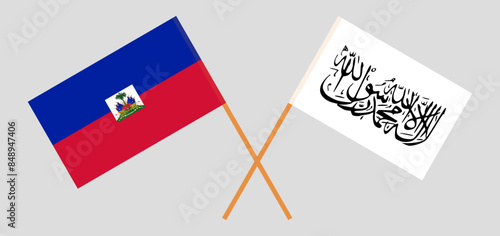 Crossed flags of Haiti and Taliban. Official colors. Correct proportion photo