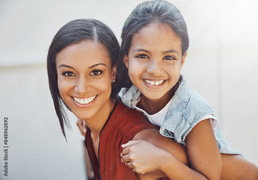 Smile, portrait and mother piggyback kid for family bonding, care and connection at home together. Mom, face and carry happy girl child at house for support, play or healthy relationship of parent Smile, portrait and mother piggyback kid for family bonding, care and connection at home together. Mom, face and carry happy girl child at house for support, play or healthy relationship of parent