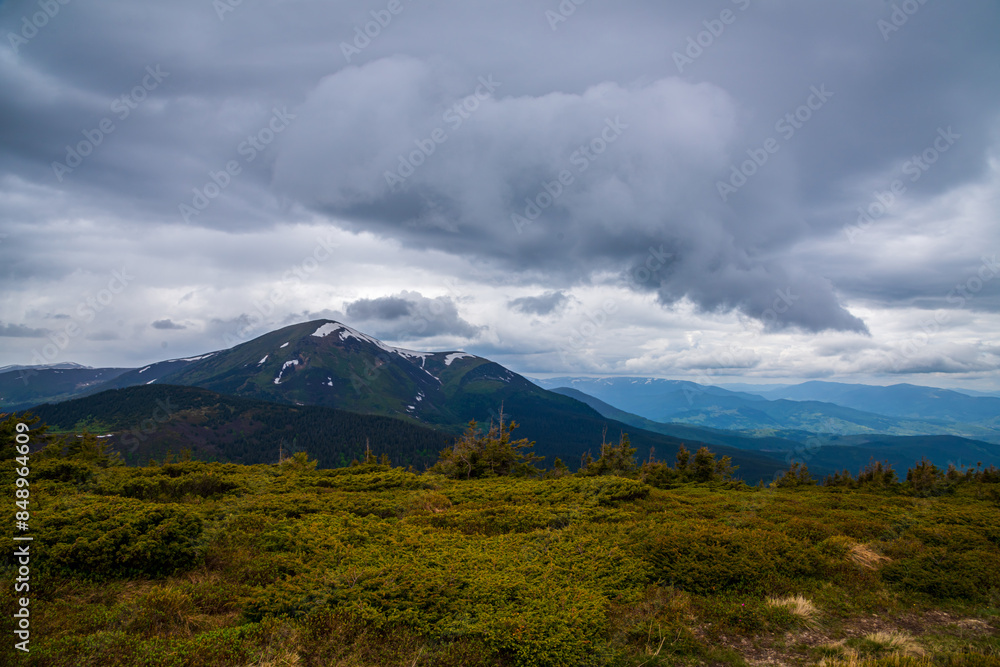 Wonderful nature. Rocky land, high mountains, dramatic sky. Wonderful nature. Rocky land, high mountains, dramatic sky.