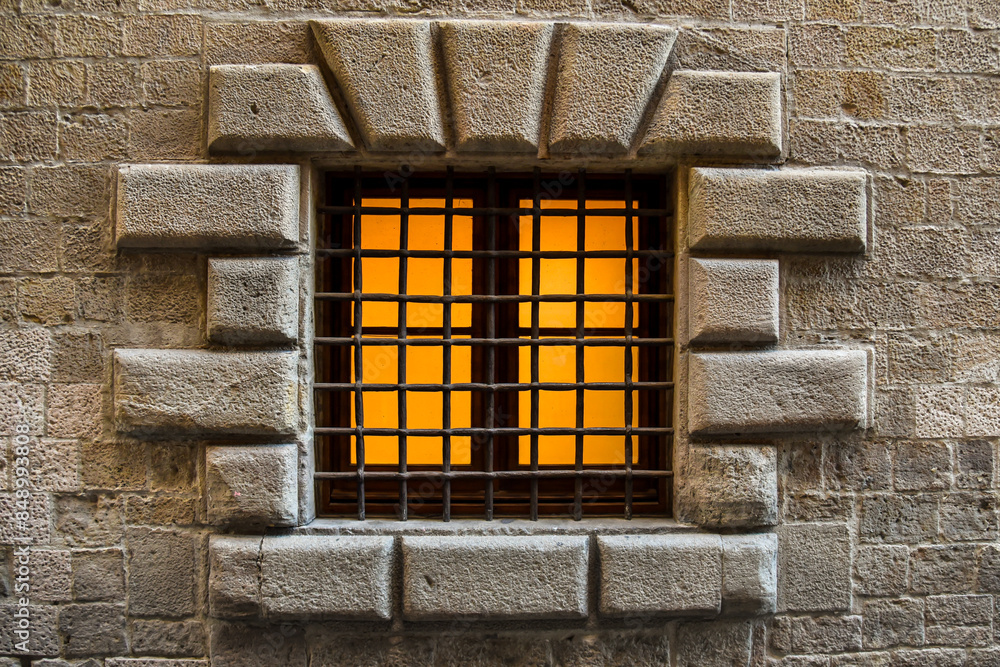 medieval window with old medieval stone wall in Barcelona
