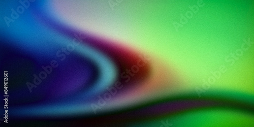 Abstract gradient background featuring a dynamic blend of vibrant colors, including shades of blue, purple, red, and green. Colors transition smoothly, creating a visually appealing and fluid effect © Life Background