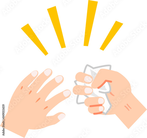 紙を握りしめ丸める手