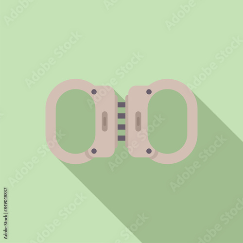 Pair of metal handcuffs closed, representing the concept of law enforcement and criminal justice