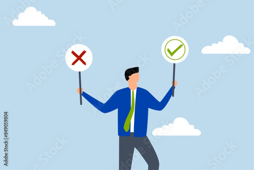 Business decision right or wrong, thoughtful businessman holds right or wrong left and right hand when making decision.