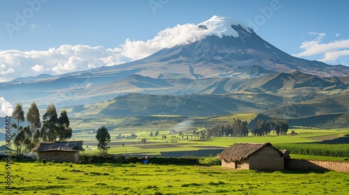 A mountain range with a small village in the foreground