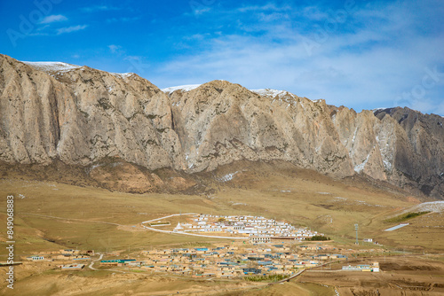 Ganjia Secret Realm, Gannan Tibetan Autonomous Prefecture, Gansu Province - grassland under the snow-capped mountains photo