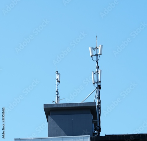 Japanese cell site on the rooftop of the building photo