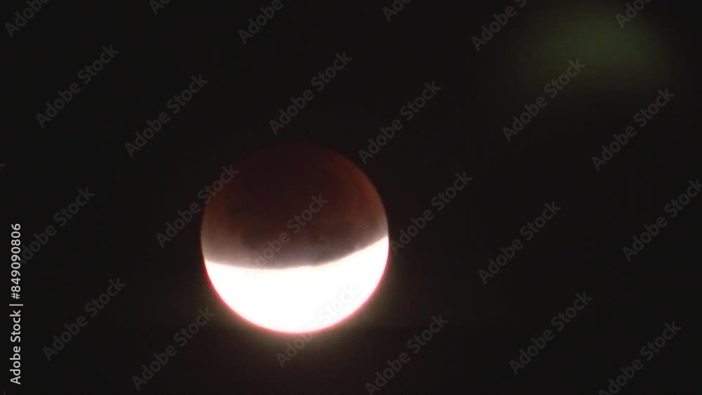 Dark night sky and Supermoon during total lunar eclipse that occurred in month of September 2015 called Harvest Moon - timelapse. Topics: space, astronomy, light, cosmos, weather Dark night sky and Supermoon during total lunar eclipse that occurred in month of September 2015 called Harvest Moon - timelapse. Topics: space, astronomy, light, cosmos, weather
