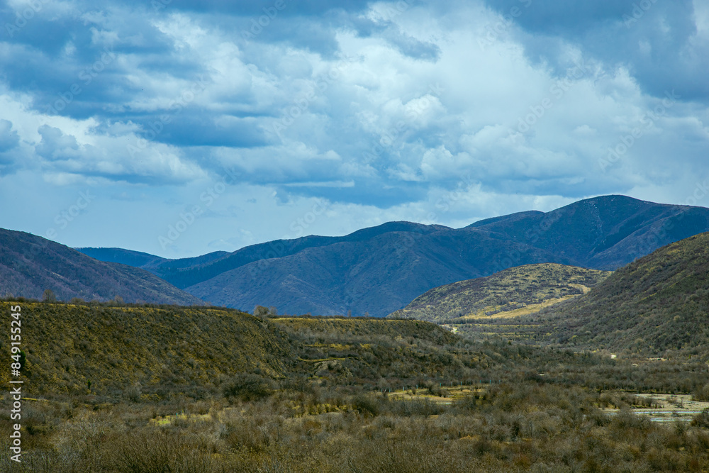 Fototapeta premium Aba, Sichuan Province - mountains and grasslands under the blue sky