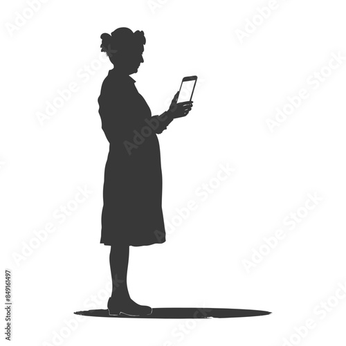 Silhouette of elderly woman in dress, intently viewing a tablet, against white background.
