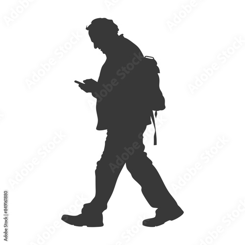 Silhouette of a Man Walking with Backpack, Texting on Phone.