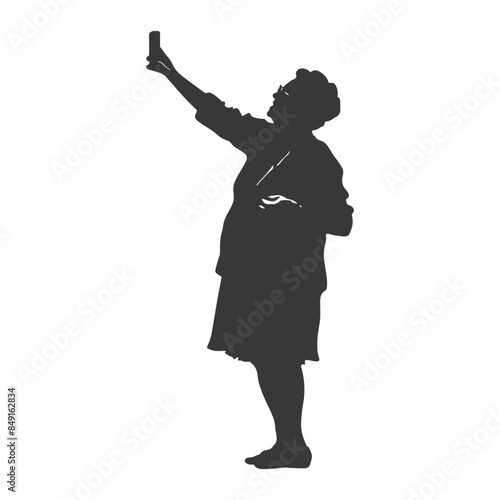 Silhouette Selfie: Barefoot Woman Capturing a Moment.