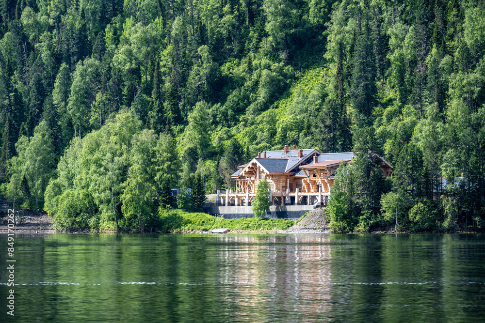typical summer landscape with mountains, lake and forest in the area of ​​Lake Teletskoye in Altai