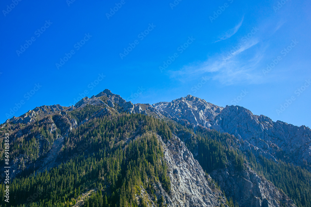 Fototapeta premium Jiuzhaigou, Aba, Sichuan Province - lakes and mountains under the blue sky