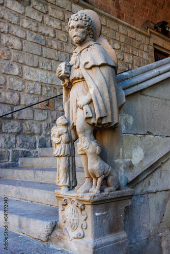 Photography Old Gothic  statue of a shepherd with a dog, former Hospital Sant Pau,  Barcelon