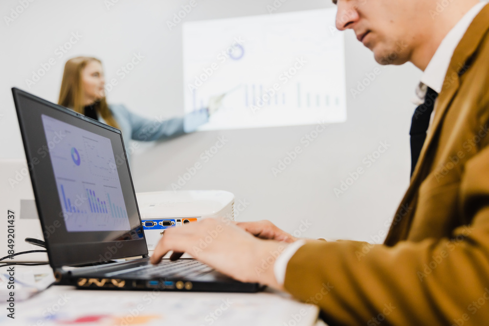 Fototapeta premium Diverse business team having a meeting in a creative workplace