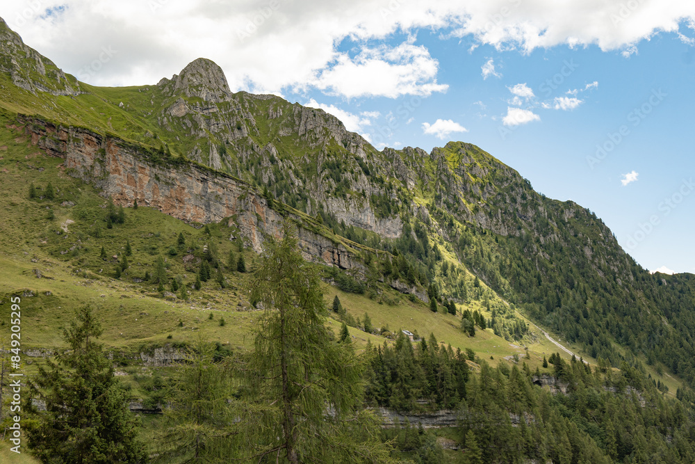 Obraz premium Cloudy mountain peaks of The Dolomites at the Brenta Adamello Mountains, Trentino, Italy