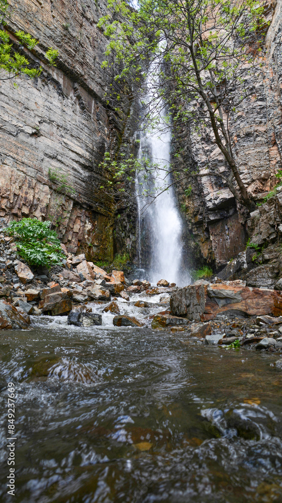 Obraz premium Tall waterfall wall art. Hight waterfall print set. Rocky mount and cascading waterfall. Beautiful waterfall picture