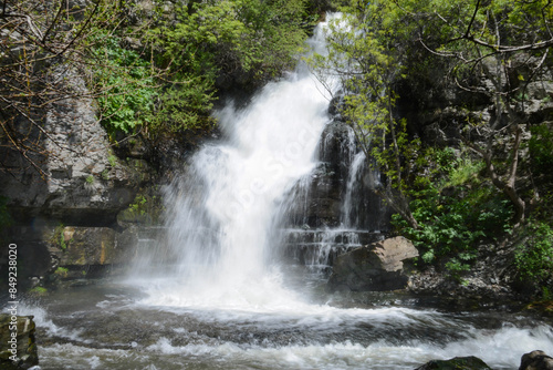 Waterfall in forest. Hight waterfall. Watery waterfall. Tropical forest and tall waterfall wall art. Deep forest and river