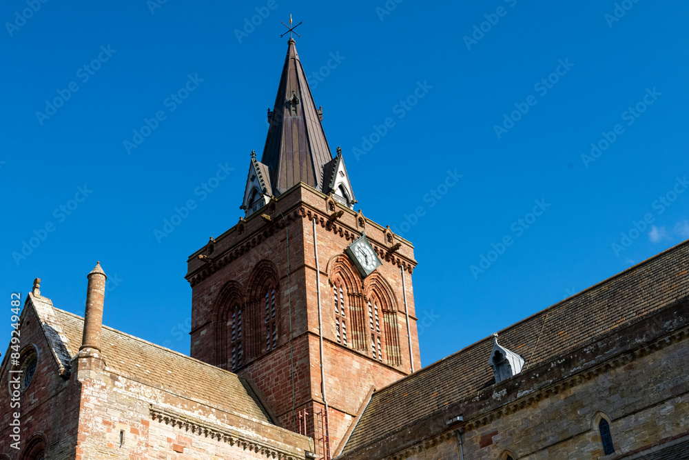 Kirkwall cathedral of Scotland clock tower church in the shining sun Kirkwall cathedral of Scotland clock tower church in the shining sun