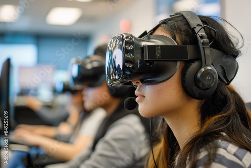 Students wearing VR headsets engage in an educational simulation, demonstrating the potential of virtual reality technology for learning © Ilia Nesolenyi