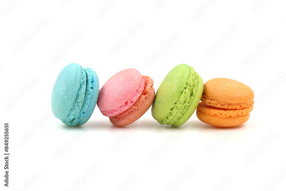 Sweet colorful macarons isolated on white background. Tasty colourful macaroons. Sweet colorful macarons isolated on white background. Tasty colourful macaroons.