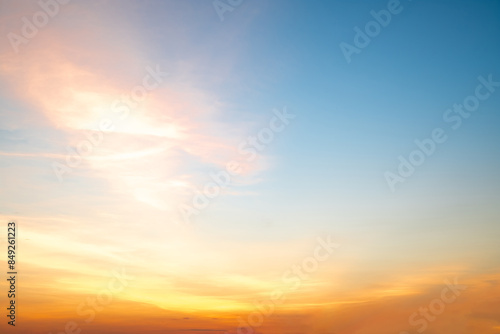 Fototapeta Naklejka Na Ścianę i Meble -  Beautiful , luxury soft gradient orange gold clouds and sunlight on the blue sky perfect for the background, take in everning,Twilight, Large size, high definition landscape photo