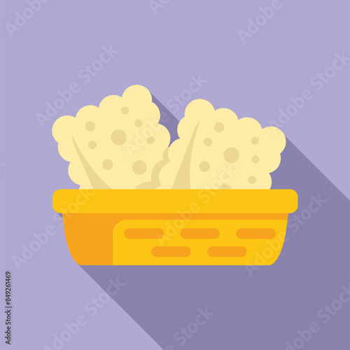 Yellow plastic basket holding clean washcloths for drying after being washed