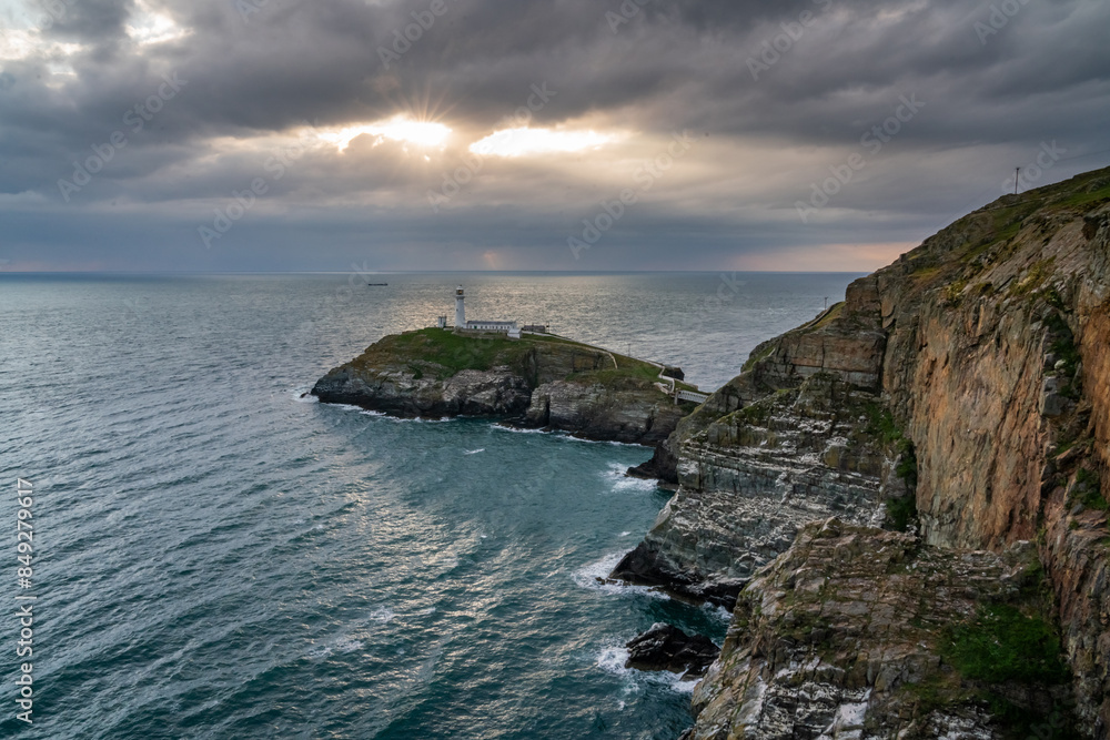 Sun beams around South Stack Lighthouse Sun beams around South Stack Lighthouse