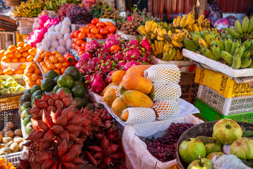 Fototapeta Naklejka Na Ścianę i Meble -  Tropical fruits and vegetables on local street market in Cambodia