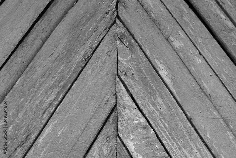 Old green wooden fence, abstract background. Black and white photo Old green wooden fence, abstract background. Black and white photo