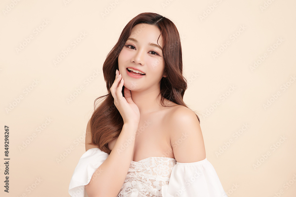 Beautiful young asian woman with clean fresh skin on beige background, Face care, Facial treatment, Cosmetology, beauty and spa, Asian women portrait. Beautiful young asian woman with clean fresh skin on beige background, Face care, Facial treatment, Cosmetology, beauty and spa, Asian women portrait.