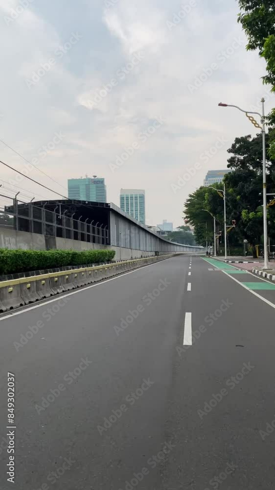 jakarta street in a quiet city without vehicles, southern part of jakarta, indonesia jakarta street in a quiet city without vehicles, southern part of jakarta, indonesia