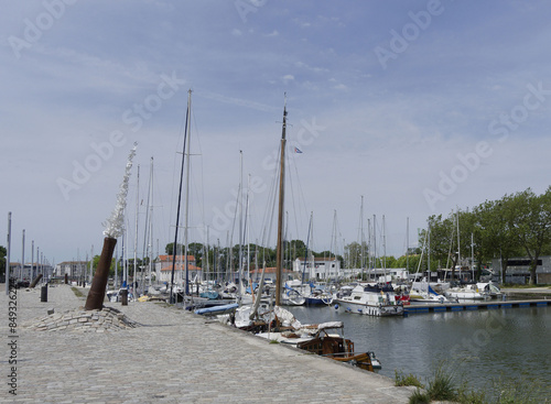 Rochefort, a city in Charente estuary in southwestern France. Marina port  Marina port with boats and Sailing ships along the street 'Quai aux vivres'
 photo