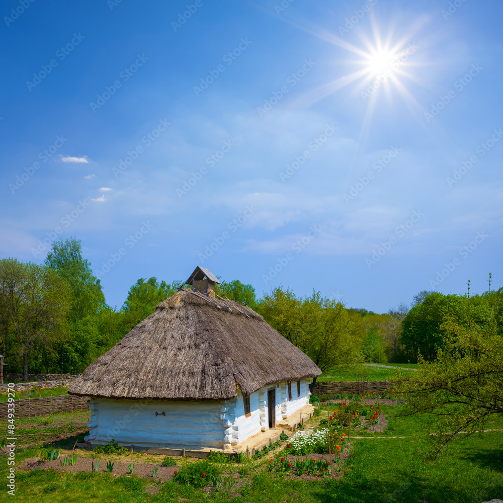 old medieval ethnic rural house at summer sunny day old medieval ethnic rural house at summer sunny day