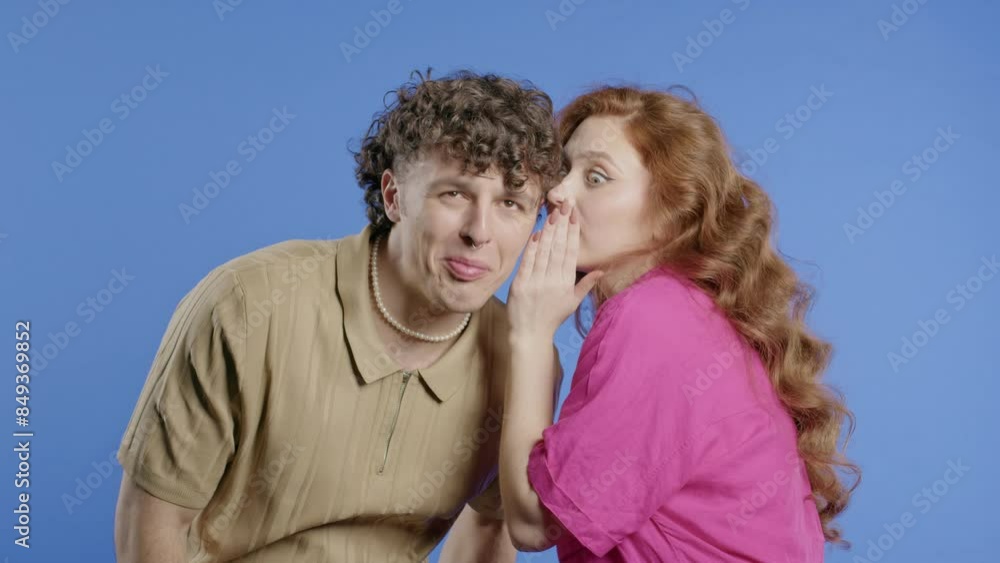 Gossiper woman whispers in boyfriends ear secret, rumors, gossips, violet studio Gossiper woman whispers in boyfriends ear secret, rumors, gossips, violet studio