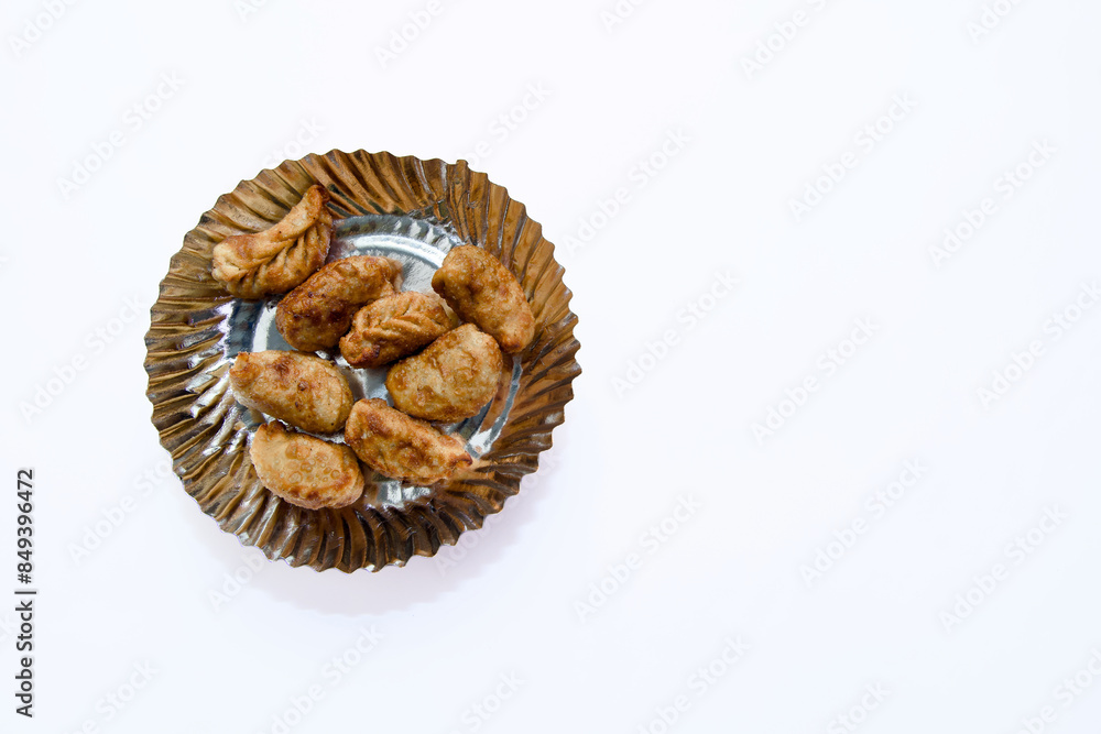 Golden Fried Momos on White Background Golden Fried Momos on White Background