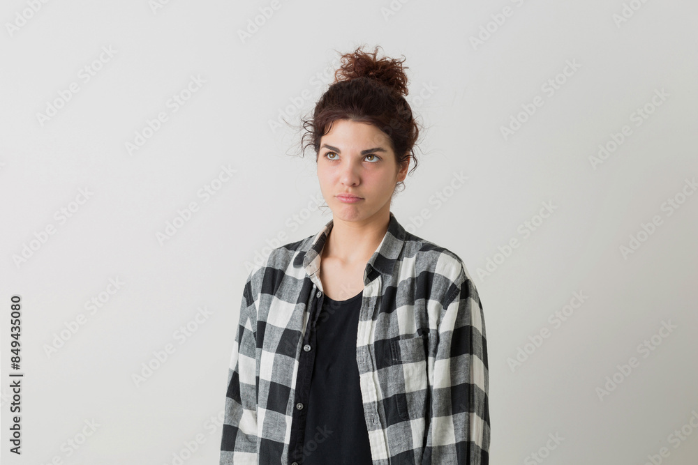 Fototapeta premium portrait of young hipster pretty woman in checkered shirt