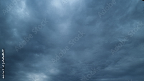 Beautiful Rainy Dark Storm Clouds. Puffy Fluffy Dark Clouds Sky Raining Motion Background.